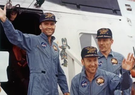 The safe return of the Apollo 13 crew on 17 April 1970. From left: Fred Haise, Jim Lovell and Jack Swigert.